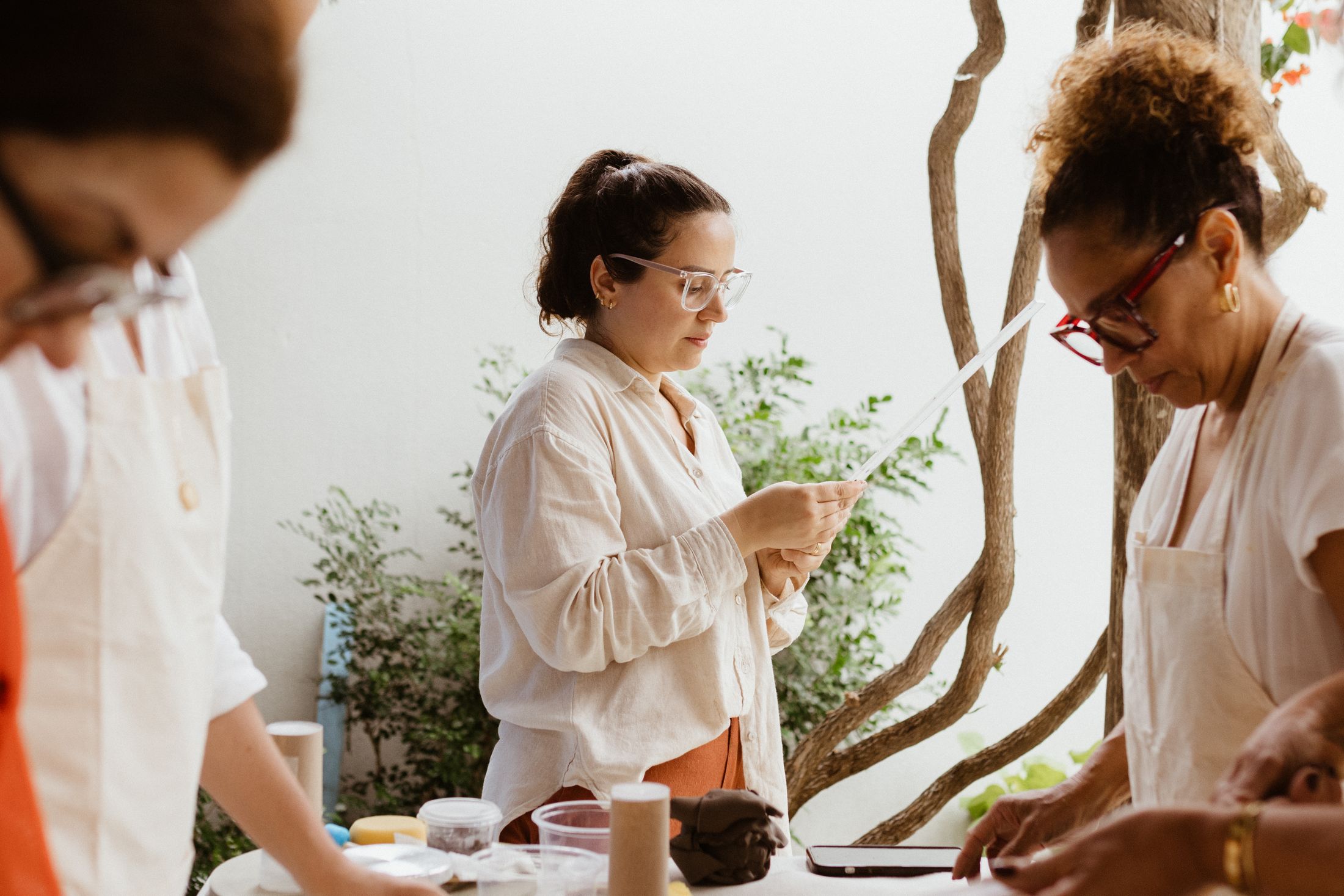 Illustrative stock: adults in a creative workshop